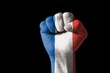 Fist painted in colors of france flag