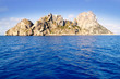 Es Vedra islet and Vedranell islands blue sea Es Vedra islet and Vedranell islands blue sea