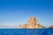 Es Vedra islet island in blue Mediterranean Es Vedra islet island in blue Mediterranean