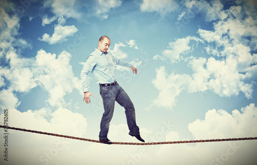 Photo: man walk on rope man walk on rope
