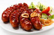 Grilled sausages and vegetables