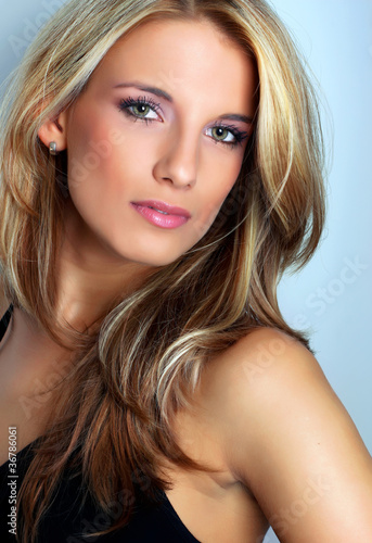 Photo: Portrait of pretty young woman Portrait of pretty young woman