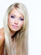 Beautiful face of blond woman with long hair