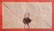 Foto: Old envelope with seal and rope Old envelope with seal and rope