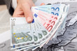 Hand with money