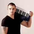 Foto: Young man with piano Young man with piano