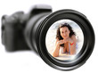 Beautiful female portrait reflected on camera lens