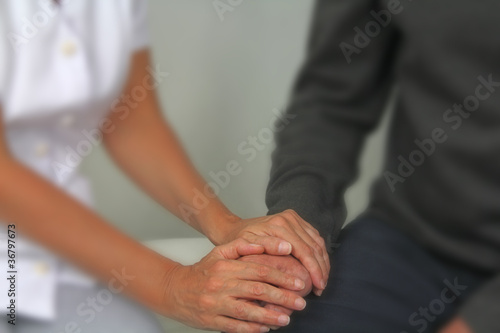 Photo: Therapist comforting male patient Therapist comforting male patient