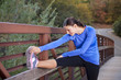 Stretching before a morning Jog