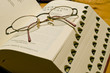 Glasses and book