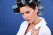 bad tempered woman with curlers in her hair