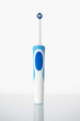 Toothbrush standing on glass shelf