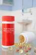 Vitamin pills on bathroom shelf