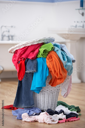 Photo: Pile of dirty washing in bathroom Pile of dirty washing in bathroom