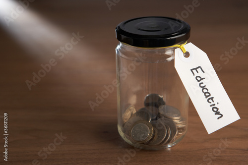 Photo: Coins in a jam jar Coins in a jam jar