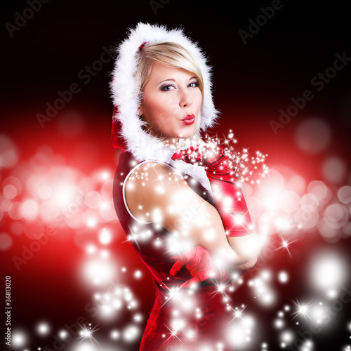 Photo: Weihnachtsfrau pustet Partikel Weihnachtsfrau pustet Partikel