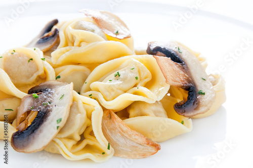 Photo: Tortellini dish with mushrooms and garlic sauteed Tortellini dish with mushrooms and garlic sauteed