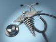 Stethoscope with symbol of medicine, caduceus.