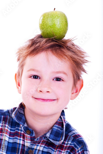 Foto: Little boy with apple. Little boy with apple.