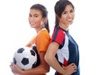 smiling girls with a soccer ball