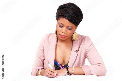 Photo: Woman filling form or signing contract Woman filling form or signing contract