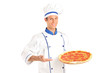 A young chef holding a pizza A young chef holding a pizza