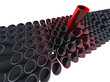 Many grey pipes with one big red Many grey pipes with one big red