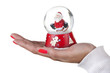 Photo: woman hand holding christmas globe isolated on white background woman hand holding christmas globe isolated on white background