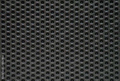 Photo: Photo of a natural perforated metal surface Photo of a natural perforated metal surface