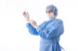 Foto: Female surgeon or nurse putting on sterile gloves Female surgeon or nurse putting on sterile gloves