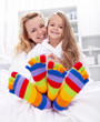 Happy girl and woman at home