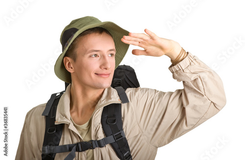Photo: young man dressed in a tourist young man dressed in a tourist