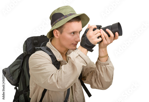 Photo: young man dressed in a tourist young man dressed in a tourist