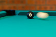 Billiard - the cue ball strikes the black
