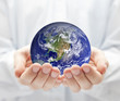Photo: Earth in hands Earth in hands