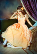 A girl in a ball gown.