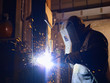 Photo: Man at work as welder in heavy industry Man at work as welder in heavy industry