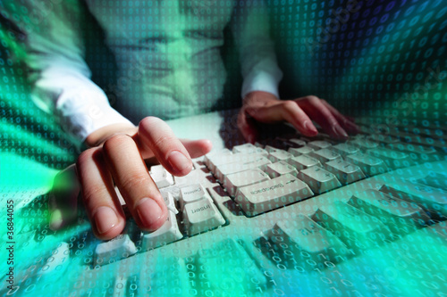 Photo: Typing at keyboard Typing at keyboard