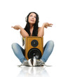 Young beautiful girl in headphones with wooden speaker Young beautiful girl in headphones with wooden speaker