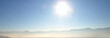 Panorama of the landscape with mountains and sun