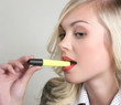 Beautiful young woman in a bright tie in the office Beautiful young woman in a bright tie in the office