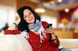 youthful pretty lady with smartphone
