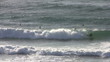 Surfers at Amado beach in Portugal