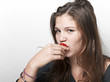 Young beautiful happy smiling woman with strawberry