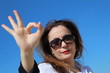 Business woman shows with her fingers that everything is ok