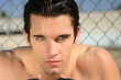 Photo: Portrait of a shirtless serious young man Portrait of a shirtless serious young man