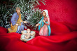 Presepe su fondo rosso