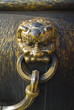 monster head on a huge cooper jar