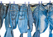 Some blue jeans drying on washing line
