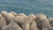 Concrete breakwater in seashore